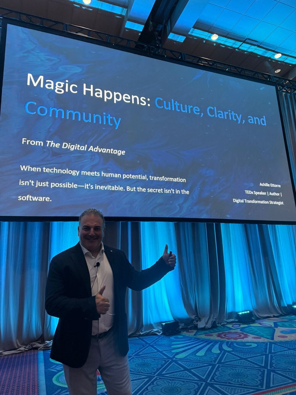 Achille Ettorre delivering a keynote on AI and analytics leadership