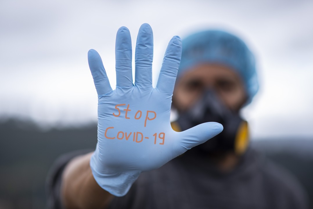 Front line worker in gloves and mask